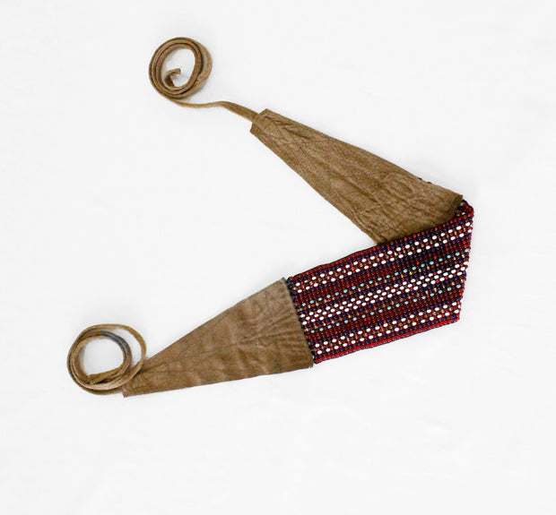 beaded belt with leather ties in red metis sash pattern